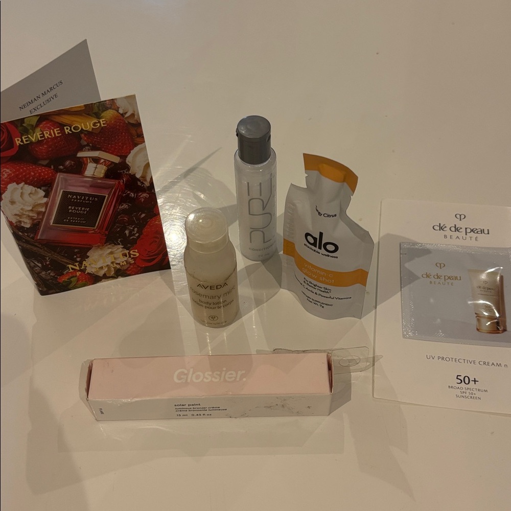 Glossier Solar Paint full size with Reverie Rouge by Navitus, Alo, Cle de Peau